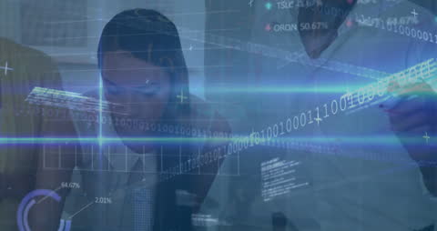 Diverse Team Analyzing Digital Data and Stock Market Trends