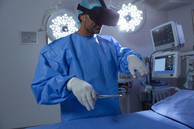 This image depicts a male surgeon using a virtual reality headset to practice surgery in an operating room. It highlights the integration of advanced technology in medical training and healthcare. This can be used in articles, presentations, and educational materials related to medical innovation, surgical training, and the use of VR in healthcare.