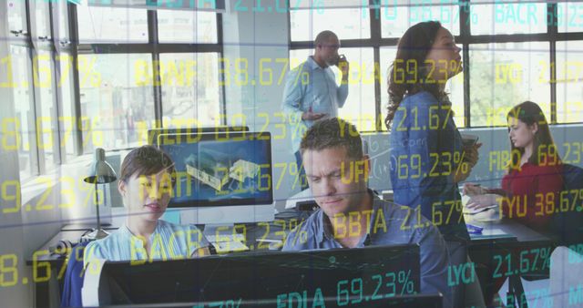Group of financial professionals in modern office working with stock market data overlay. Suitable for illustrations related to finance, stock market, teamwork, business analytics, modern workspace, or economic discussions.
