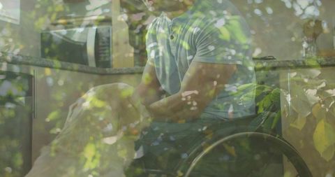 Man in Wheelchair Interacting with Golden Retriever at Home