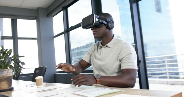 African American Man Experiencing Virtual Reality in Modern Office - Download Free Stock Images Pikwizard.com