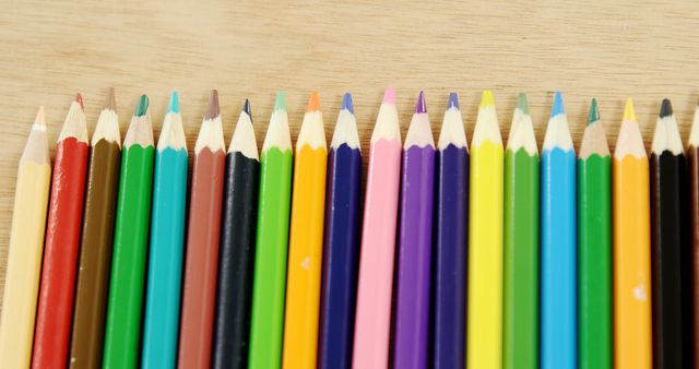 Colorful Row of Sharpened Colored Pencils on Wooden Surface - Download Free Stock Images Pikwizard.com