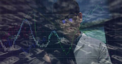 Digital Analytics: Businessman Analyzing Data on Tablet with Graph