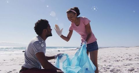 Young Volunteers Cleaning Beach, Promoting Eco Awareness