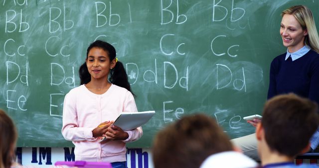 Confident Young Student Presenting in Front of Classroom - Download Free Stock Images Pikwizard.com