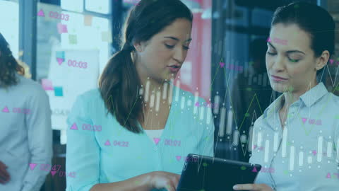 Businesswomen Analyzing Digital Financial Data on Tablet