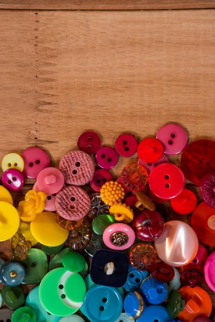 Close-up of various types of buttons on a table