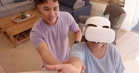 Senior Woman Experiencing Virtual Reality Therapy with Guidance