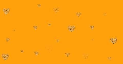 Flower Hearts with Hypnotic Motion on Vibrant Orange Backdrop - Download Free Stock Images Pikwizard.com