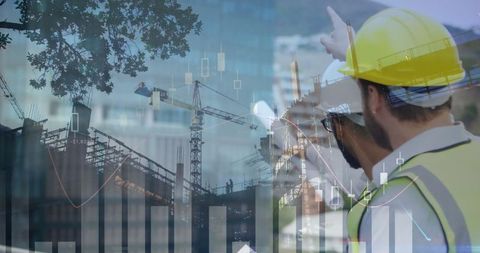 Construction Workers Analyzing Digital Data at Building Site