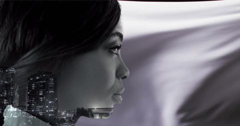 Profile of Woman Blended with Dreamy Abstract Cityscape