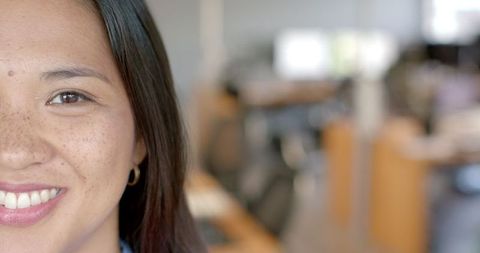 Confident Asian Businesswoman in Professional Office Environment