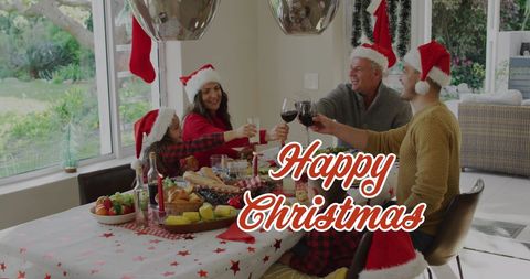 Family Toasting at Christmas Table with Traditional Dinner