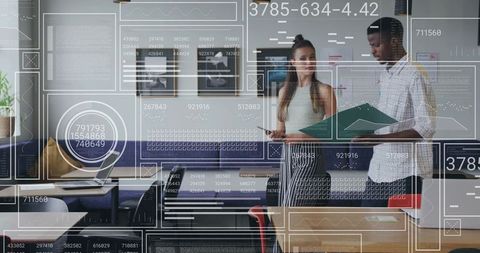 Young professionals collaborating in office lounge with data overlay and digital devices