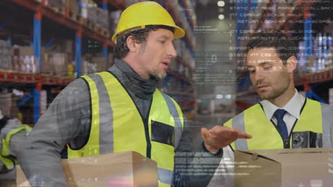 Warehouse Workers Analyzing Digital Data for Logistics Improvement