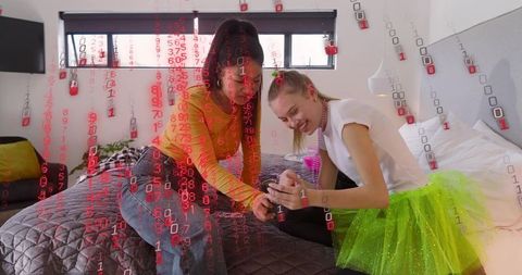 Friends sharing phone laughing in colorful bedroom with binary code overlay