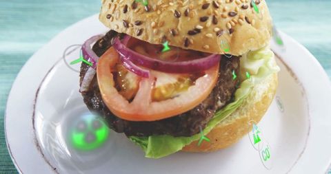 Delicious Gourmet Burger with Rustic Seeded Roll on Plate