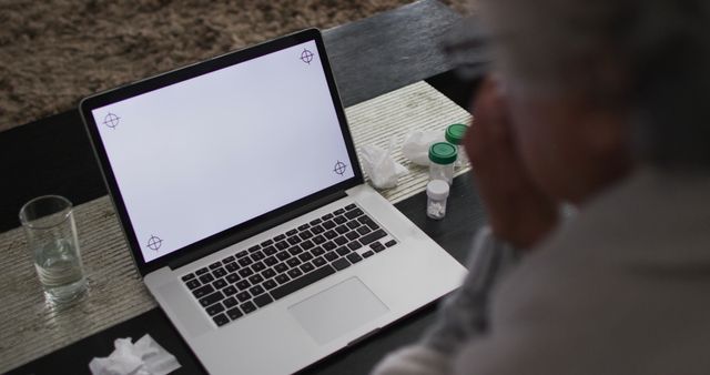 Elderly Person Using Laptop for Online Health Consultation - Download Free Stock Images Pikwizard.com