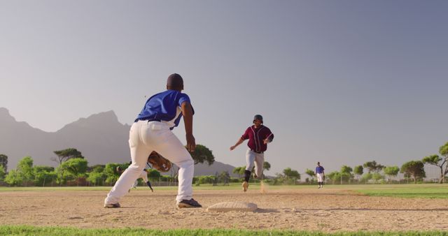 Youth Baseball Game in Action on Sunny Day - Download Free Stock Images Pikwizard.com