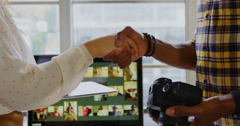 Collaboration Between Creative Professionals in Modern Office