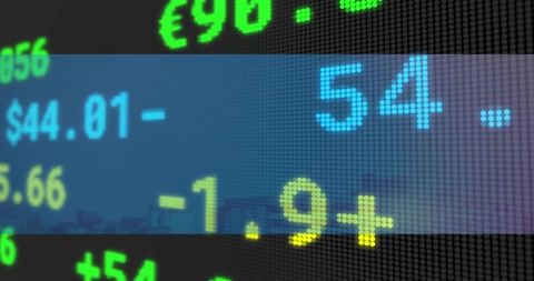 Displaying LED market ticker with glowing currency symbols over city skyline