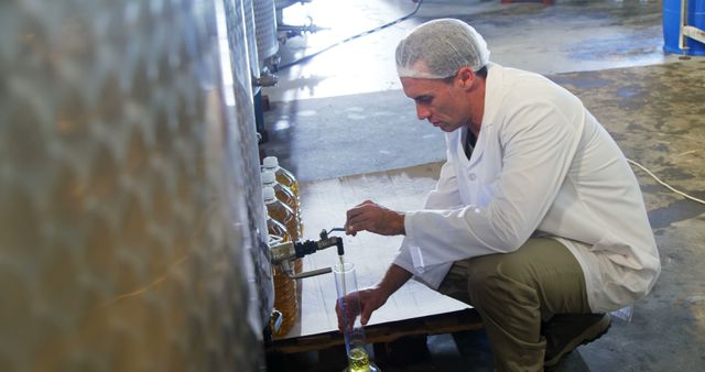 Quality Control Engineer Testing Liquid Samples in Industrial Facility - Download Free Stock Images Pikwizard.com