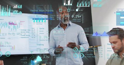 Business leader presenting data-driven dashboard with holographic charts and analytics