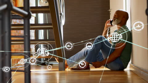 Senior Man Engaging with Global Communication on Phone