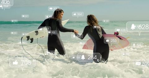 Dynamic surfers entering ocean with social media elements