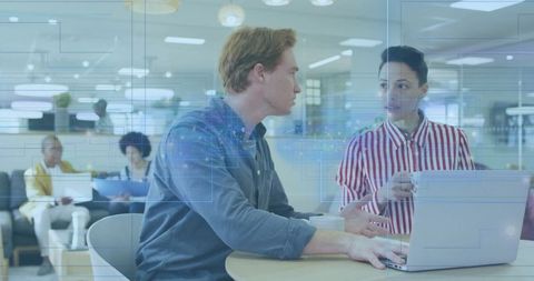 Team Collaboration with Digital Circuit Overlay in Modern Office