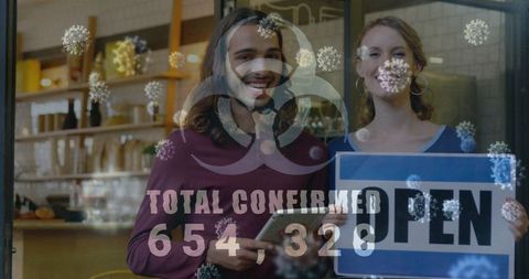 Small Business Owners Smiling During Pandemic Reopening