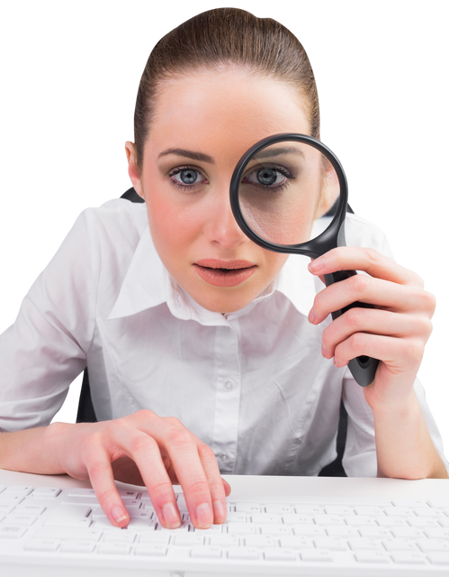 Young Woman Looking Through Magnifying Glass While Typing on Keyboard Transparent Background - Download Free Stock Videos Pikwizard.com