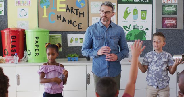 Teacher educating children on recycling during an environmental lesson. Class is focused on sustainability and waste management, with students participating in the discussion. Can be used for educational content, environmental awareness campaigns, and sustainability initiatives.