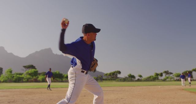 Baseball Player Throwing Ball During Game on Sunny Day - Download Free Stock Images Pikwizard.com