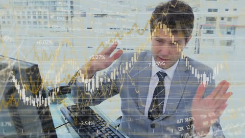 Stressful Businessman Analyzing Market Stock Data on Computer