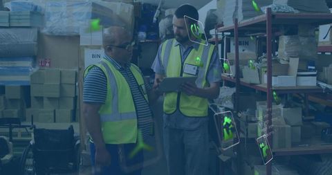 Warehouse workers managing inventory with electronic devices