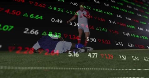 Night soccer tackle on turf with stock market data overlay conveying competition and risk