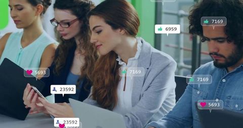 Modern Business Team Using Technology for Collaboration and Social Engagement