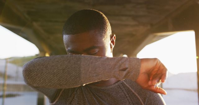 Athlete Wiping Sweat During Outdoor Workout - Download Free Stock Images Pikwizard.com