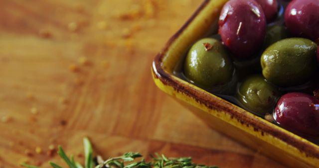 Close-Up of Assorted Olives in Ceramic Bowl on Wooden Surface - Download Free Stock Images Pikwizard.com