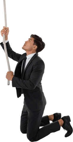 businessman pulling transparent rope while kneeling in determination - Download Free Stock Videos Pikwizard.com