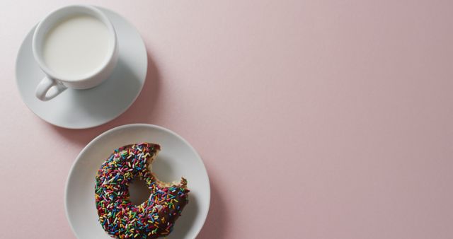 Donut with Rainbow Sprinkles and Cup of Milk on Pink Background - Download Free Stock Images Pikwizard.com
