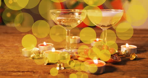 Romantic Candlelit Setting with Champagne Cocktails and Bokeh Lights