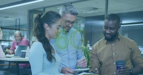 Diverse Team Exploring 6G Innovations in a Modern Office