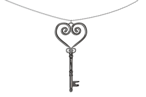 Silver heart-key pendant on transparent background