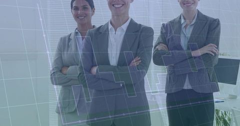 Business women standing crossing arms smiling, leading data-driven team with analytics