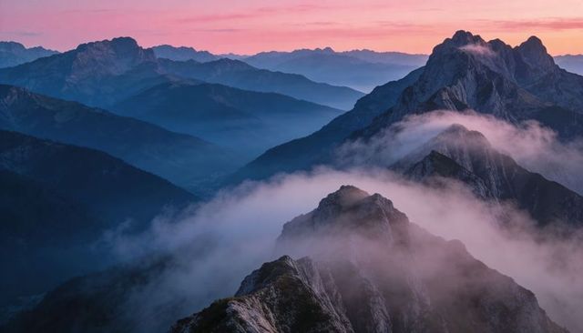 Sunrise Mist Wrapping Jagged Alpine Ridge, Layered Peaks Bathing in Pink Dawn Light