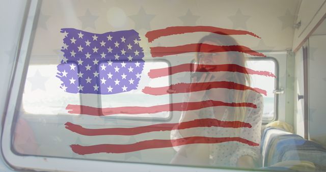 Image shows a woman relaxing inside a camper with an overlay of the United States flag on the window. Useful for themes related to freedom, American culture, travel, vacation, and celebrating American holidays such as Independence Day.