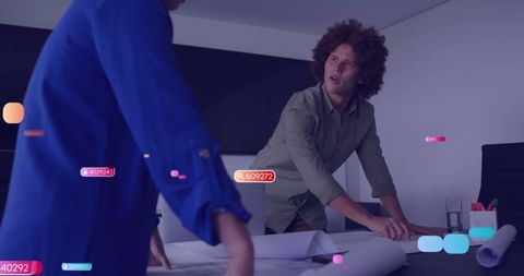 Professionals in Conference Room Engaging in Innovative Planning Session