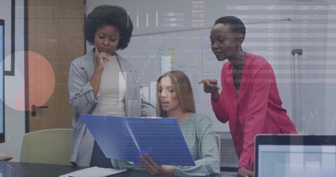 Diverse Business Team Analyzing Financial Data Documents